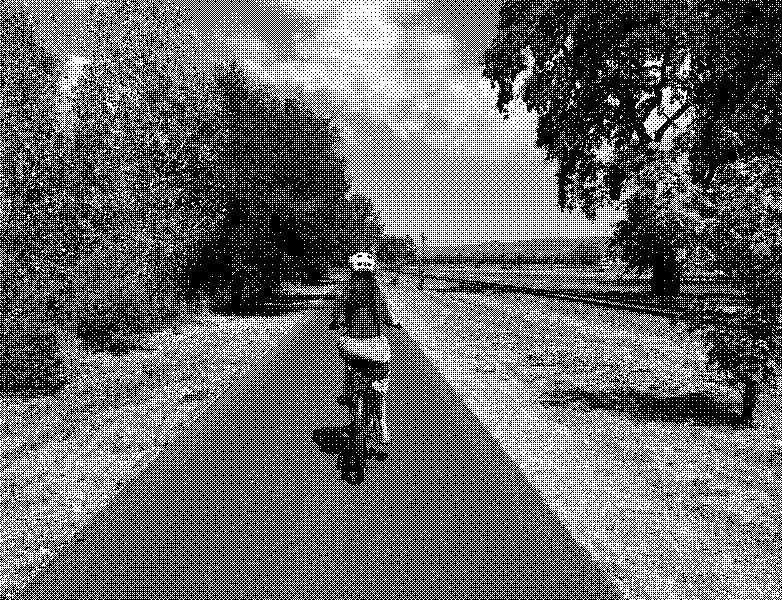 Cycling beneath a bright September sky, with the hills ahead.