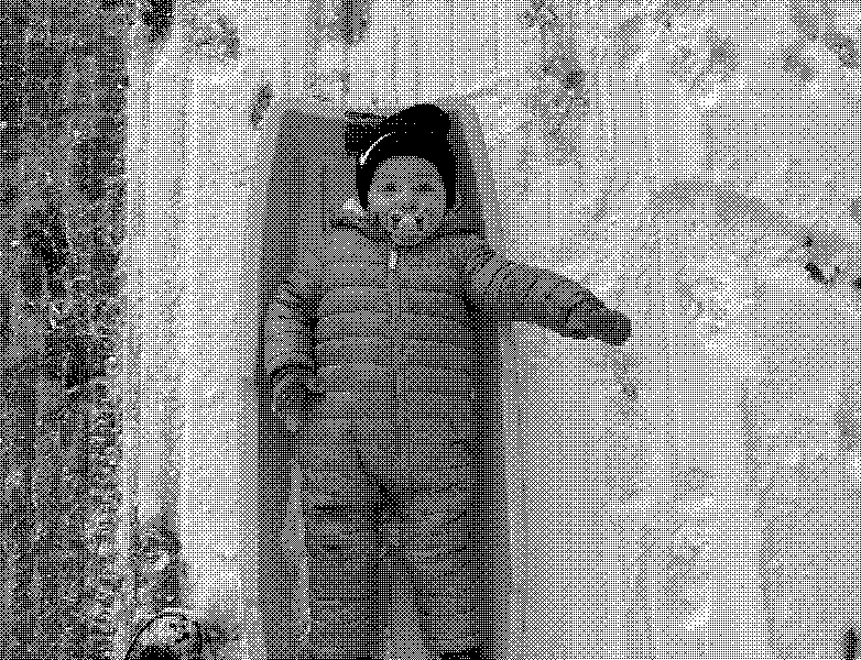 Bundled up and ready for a snowy sled ride.